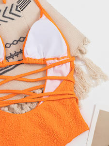 Bikini naranja de una pieza con logotipo personalizado para mujer, venta al por mayor, traje de baño calado de cintura alta, traje de baño con tirantes y cordones sin espalda - Product Image 4