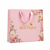 Emballage de boutique sacs en papier biodégradables pour faire du shopping ruban sérigraphié en relief avec logo personnalisé pour vêtements fourrure