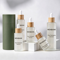 Bouteilles compte-gouttes en verre givré transparent réutilisables de 20 ml/30 ml/50 ml/80 ml pour les soins de la peau, les sérums, les emballages cosmétiques avec couvercle en bambou