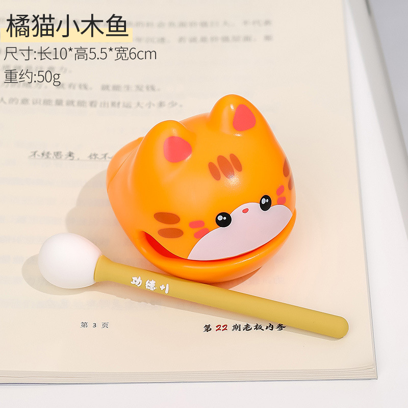 Orange cat-small wooden fish