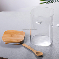 Vente en gros de pots en verre borosilicate transparent de qualité supérieure, carrés, avec couvercle en bambou et cuillère, hermétiques, pour le stockage d'épices, de sel, de bonbons, de noix