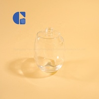 Flacon de parfum vide en verre de luxe 100 ml, design incliné, fond épais, transparent