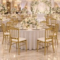 Chaise d'événement hôtelier en fer doré empilable populaire avec coussin pour la location en gros de chaises de mariage et d'hôtel