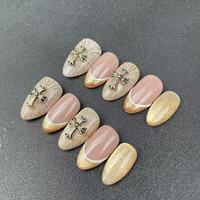 Ongles artificiels faits main de haute qualité, forme amande, style doré, réutilisables, vente en gros usine