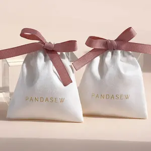2024 nuovo sacchetto di gioielli personalizzato all'ingrosso bianco coulisse cotone mussola regalo sacchetto di imballaggio con nastro per gioielli