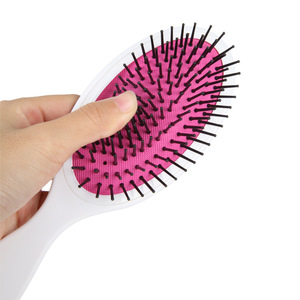 Brosse à cheveux ovale à coussin d'air en nylon avec coussin pour masser le cuir chevelu et lisser les cheveux longs - Product Image 1