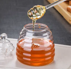 Frascos de miel de abeja superventas del fabricante en recipientes de vidrio de borosilicato de 8,5 onzas con logotipo personalizado y cubo con tapa