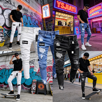 Fabricant de denim YSJY, pantalon personnalisé déchiré et usé, badges, patchs artistiques, jean skinny biker blanc, pantalon slim pour homme