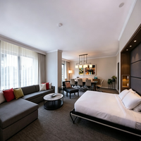 Modernes Kommerzielles Hotel-Schlafzimmer-Einrichtungsset: L-förmiges Sofa, Gepolstertes Wandpaneel, Nachttisch, Bettbox, TV-Schrank