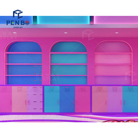 Présentoir de magasin de bonbons coloré personnalisé Étagères de vitrine de magasin de bonbons pour comptoir de magasin de bonbons