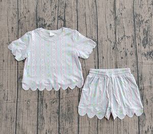 Vêtements pour filles en bas âge de haute qualité OEM, vente en gros, ensemble deux pièces en polyester 100% pour filles, short et haut à volants pour l'été - Product Image 5