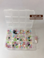 Vente chaude : Kit de 12 compartiments de strass pour ongles en résine, nœuds, perles, cristaux et fleurs pour salon de beauté