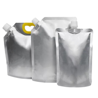 Poche en film d'aluminium OEM avec bec verseur et poignée inclinée pour emballage alimentaire sécurisé de liquides, jus et boissons