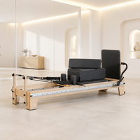 Massives Eichenholz Pilates Reformer Gerät mit Gleitwagen, Federwiderstand und gepolstertem Kissen für Studio und Heimtraining