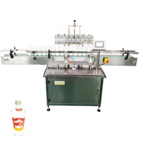 Ligne de machines de remplissage, de bouchage et d'étiquetage de mini-bouteilles d'alcool de 50 ml avec vodka, whisky, gin, spiritueux