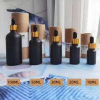 Flacon d'huile essentielle en verre Boston avec logo personnalisé, 1 oz, 2 oz, 50 ml, 100 ml, emballage de luxe noir pour huile capillaire avec compte-gouttes