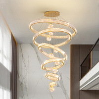 Nouveau design de lustre en cristal LED surdimensionné de luxe personnalisé pour la décoration intérieure d'hôtels, de villas et de centres commerciaux