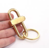 Porte-clés en laiton avec petit fermoir coulissant ovale à bouton-poussoir latéral pour verrouillage