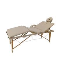 Table de massage portable de haute qualité en bois, pliable en quatre parties, réglable, pour salon de beauté, thérapie des méridiens