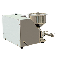 La machine de remplissage de crème pour macarons contrôlée par écran PLC, avec fonction de dosage automatique