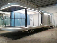 Maisonnette de luxe moderne en structure acier, portable, type caravane, écologique, installation facile pour appartement et cour.