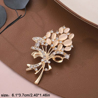 Broche de mode pour femme, ornée de strass effet diamant et de pierres œil de chat en forme de fleur, pour corsage et revers, accessoires vestimentaires