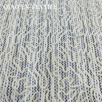 Tissu en dentelle crochetée abstrait à motif vague blanc crème, maille transparente pour robes et hauts