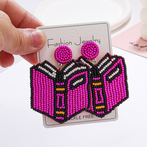 Pendientes tejidos Cuentas de arroz creativas AB Libro Colgante Pendientes Graduación Día de los maestros Regalo para mujeres Uionen 1780 - Product Image 1