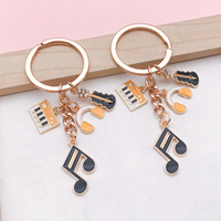 Soododo Creative Alliage Guitare et clavier électronique Note Porte-clés avec impression UV-Cadeau de fête de musique et breloque de sac