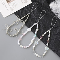 Nouvelle breloque de téléphone créative en perles et nœud papillon, tendance et polyvalente, avec chaîne de suspension pour étui, Yiwu pour femmes