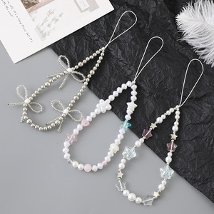 Nouvelle breloque de téléphone créative en perles <span class=keywords><strong>et</strong></span> nœud papillon, tendance <span class=keywords><strong>et</strong></span> polyvalente, avec chaîne de suspension pour étui, Yiwu pour femmes - Product Image 1