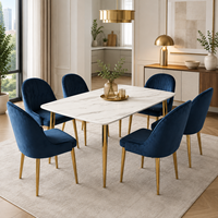 Table à manger moderne de luxe Rikkasi en pierre naturelle rectangulaire pour 6 personnes, avec pieds en acier inoxydable couleur champagne et plateau en marbre