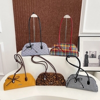 Sac fourre-tout populaire et abordable pour la vente en gros, coloré, à motif vague, à carreaux, léopard, avec nœud et fermeture éclair, à porter sous le bras ou à l'épaule