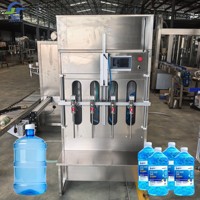 Machine de remplissage semi-automatique à gravité certifiée ISO 9001, qualité alimentaire