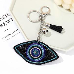 Venta al por mayor de diamantes de imitación ostentosos cristal azul diablo ojo borla colgante llavero clásico mágico pavo brillo mal de ojos encanto llavero - Product Image 3