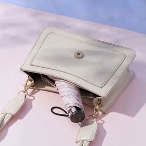 Japanese Ultra Light 190T Nylon Fabric Pongee Three <b>Fold</b> Custom Logo Pencil Anti Ultraviolet Sun Umbrella - Product Image 4