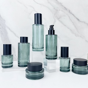 ขวดแก้วสีเขียวเข้มทรงแบนไหล่ลาด ขนาด 100/150 มล. ก้นหนา พิมพ์ลายสกรีน พร้อมฝาเกลียว สำหรับใส่โทนเนอร์ ลดราคาพิเศษ - Product Image 4