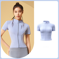 Transpirable sin costuras deportes apretado casual Fitness cremallera cuello alto ropa de manga corta de lujo Yoga Tops para mujeres