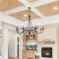 Lustre moderne réglable en hauteur, style ferme, noir mat, avec accents en laiton brossé et bras porte-bougies, pour salle à manger, éclairage suspendu