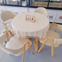 Petite table à manger ronde moderne minimaliste, ensemble de 4 chaises