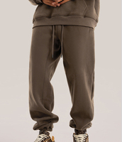 Vente en gros de pantalons pour hommes en coton de première qualité personnalisés de couleur unie avec logo personnalisé pantalons de course à pied de gymnastique pantalons de survêtement