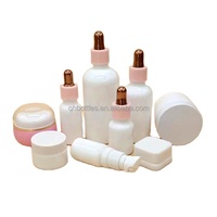 Vente Flash : Flacons d'huile essentielle ronds blancs de 5 ml, 30 ml, 50 ml en gros avec bouchon compte-gouttes pour flacon de lotion cosmétique