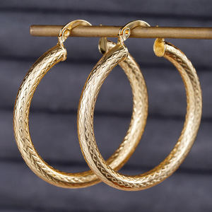 Orecchini a Cerchio Esotici Mediorientali per Donne, Gioielli Chic con Motivo a Croce Intrecciata - Product Image 1