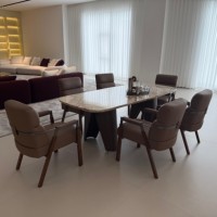 Table à manger ovale moderne en marbre naturel, surface en pierre blanc crème, base en bois de noyer, table en pierre de luxe pour usage hôtelier, personnalisable