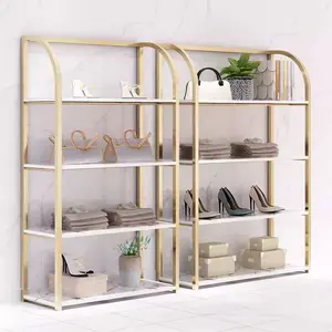 marble bright gold multi-layered display shelves display racks against the wall