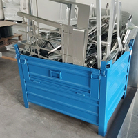Conteneur à palettes métalliques pliable à parois rabattables, thermolaqué, robuste, empilable pour la manutention en vrac en entrepôt industriel
