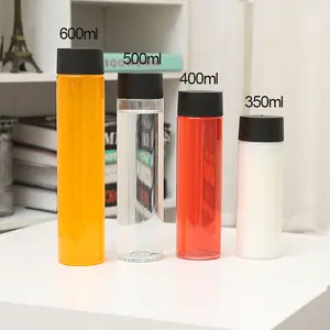 Em estoque garrafas plásticas transparentes para bebidas PET 18 onças 600 ml, formato redondo, para embalagem de suco de água, leite e chá