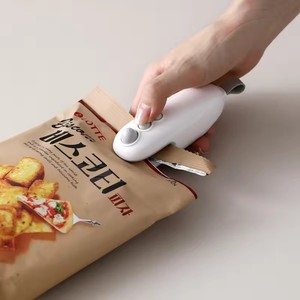 Máquina Portátil Pequeña para Envasar Alimentos, con Clip de Sellado, de Alta Calidad, para Uso Doméstico - Product Image 1