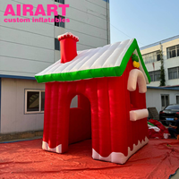 Maison de Noël gonflable personnalisée avec toit vert et murs rouges, abri gonflable du Père Noël, maison de vacances avec arche traversable
