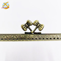 Accessoires de mode en métal pour sacs, en gros, cadre de sac à main en bronze à coudre avec fermoir à pression, design tête de papillon, taille personnalisable